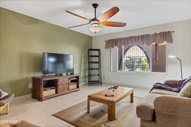 living room with light tile patterned flooring and ceiling fan