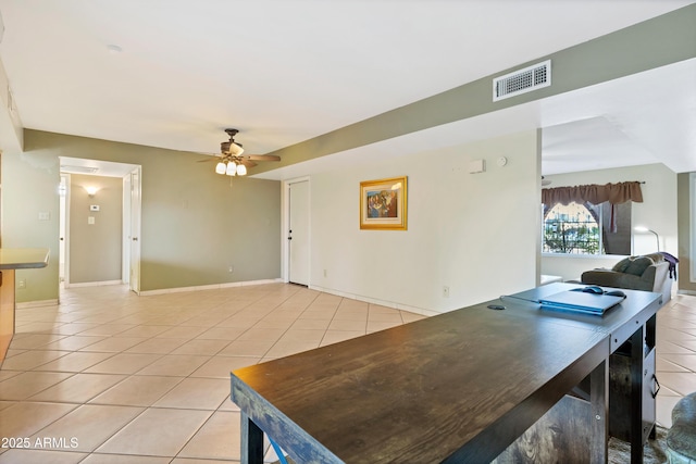 dining room featuring light tile patterned floors and ceiling fan