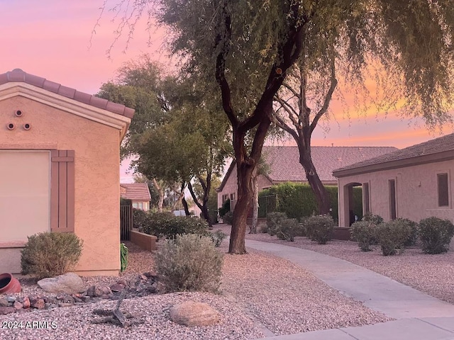 view of property exterior at dusk