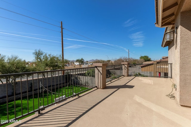 view of patio with a balcony