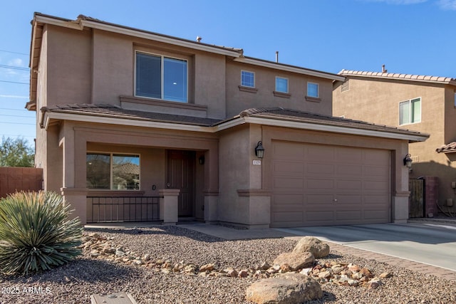 view of front of house featuring concrete driveway, a porch, and stucco siding