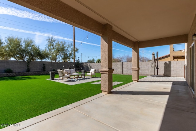 view of patio / terrace featuring a fenced backyard and an outdoor living space