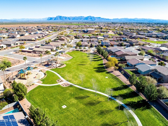 birds eye view of property featuring a mountain view and a residential view