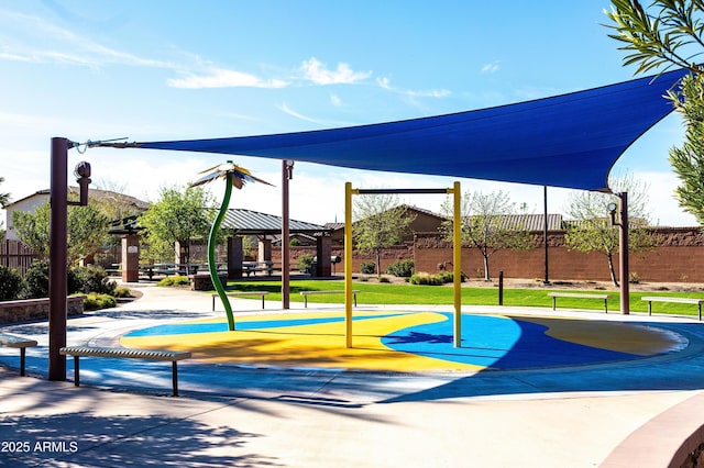 exterior space with a gazebo, a yard, and fence