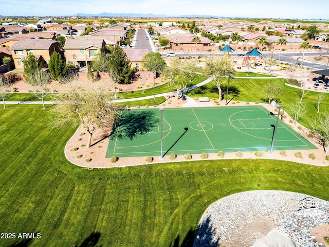 view of basketball court featuring community basketball court and a residential view