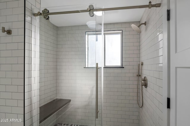 bathroom with a stall shower