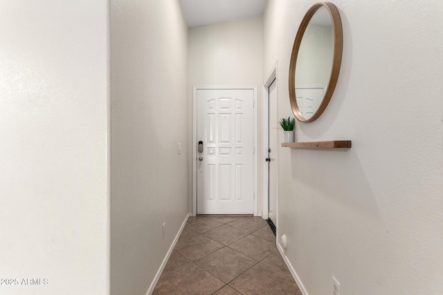 corridor with tile patterned floors