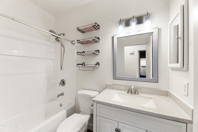 bathroom with shower / bath combination, toilet, and vanity