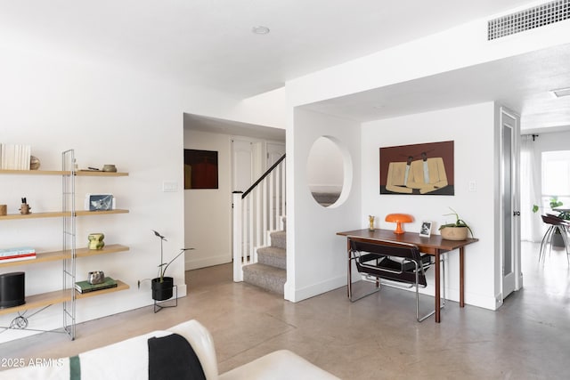 entryway featuring concrete flooring