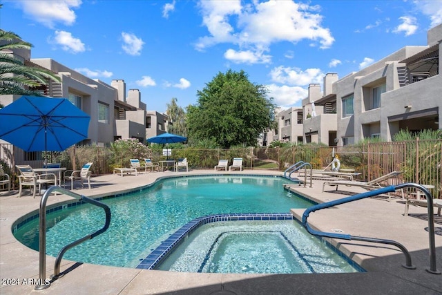 view of swimming pool featuring a patio