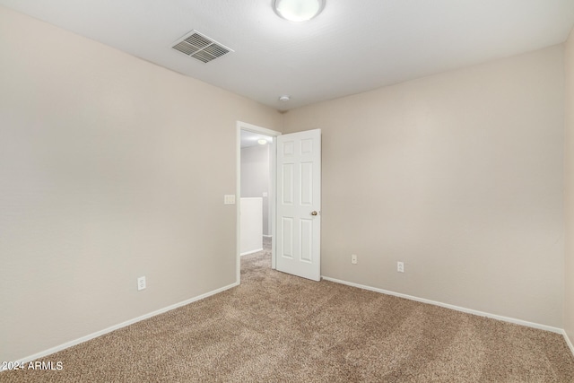 empty room with carpet floors