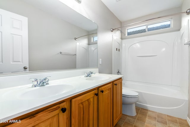 full bathroom featuring vanity, toilet, and shower / bathtub combination