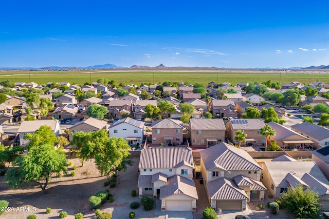 birds eye view of property featuring a mountain view