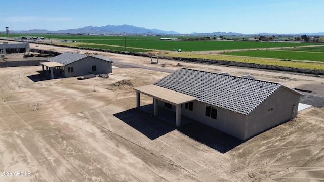 aerial view featuring a mountain view and a rural view