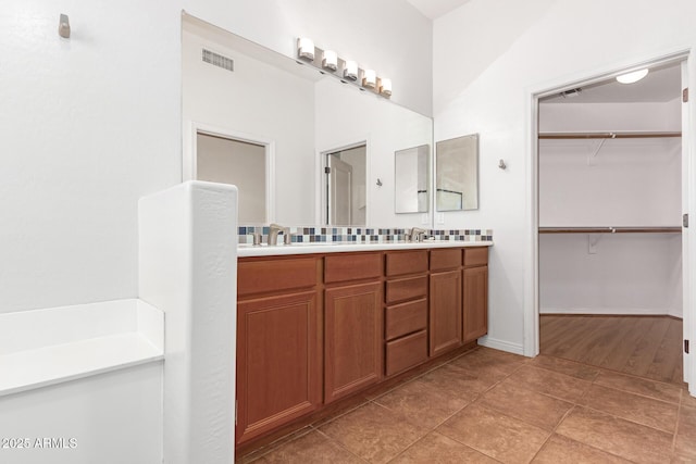 bathroom with vanity and tile patterned floors