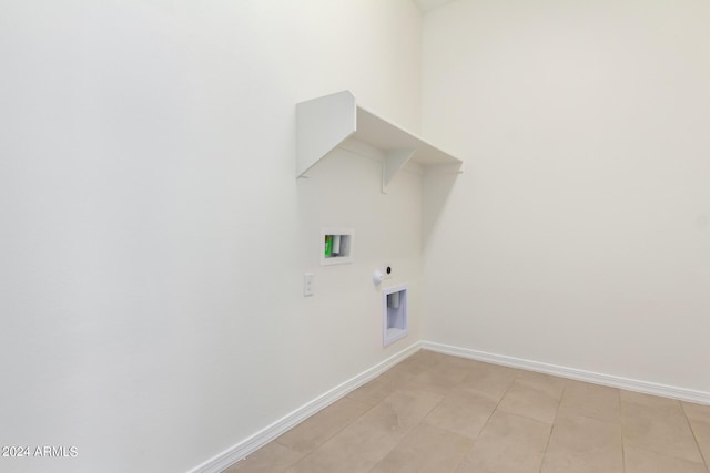 laundry room with hookup for a gas dryer, hookup for a washing machine, light tile patterned flooring, and hookup for an electric dryer