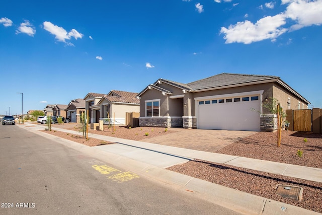 view of front of property with a garage