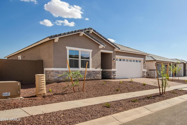 view of front of home with a garage