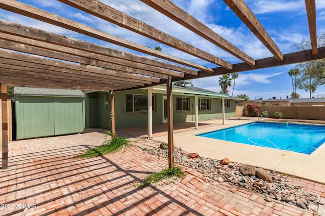 view of pool featuring fence, a patio area, a pergola, and a fenced in pool