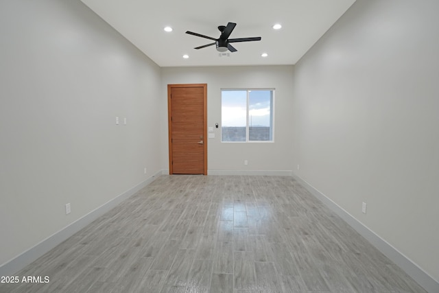 unfurnished room featuring recessed lighting, baseboards, a ceiling fan, and light wood finished floors