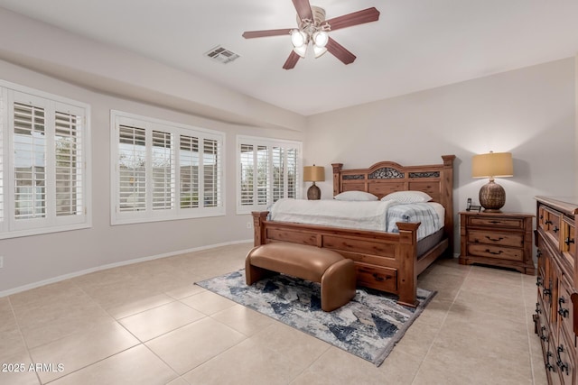 bedroom with light tile patterned floors, visible vents, ceiling fan, and baseboards