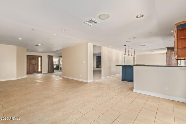 6102 E Aster Dr, Scottsdale, AZ 85254 - unfurnished living room featuring recessed lighting and light tile patterned floors