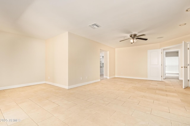 6102 E Aster Dr, Scottsdale, AZ 85254 - spare room with ceiling fan and baseboards
