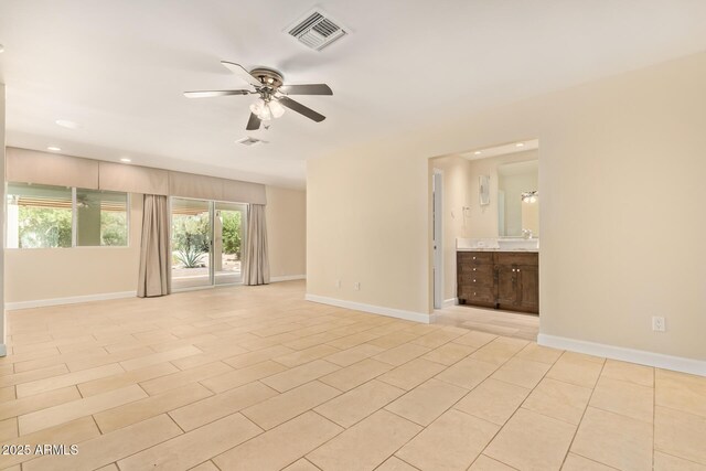 6102 E Aster Dr, Scottsdale, AZ 85254 - unfurnished room with a ceiling fan, recessed lighting, and light tile patterned floors