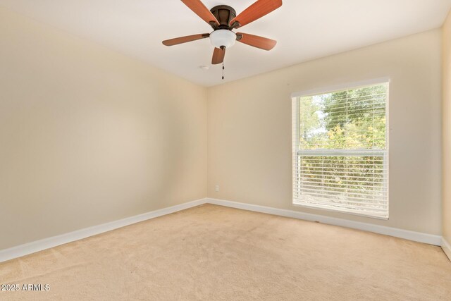 6102 E Aster Dr, Scottsdale, AZ 85254 - unfurnished room with light carpet and a ceiling fan