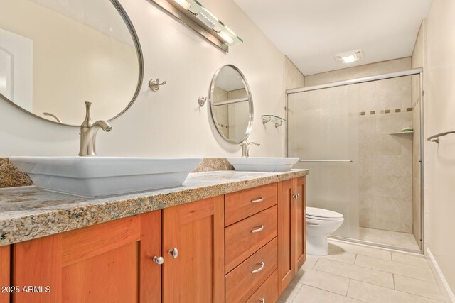 6102 E Aster Dr, Scottsdale, AZ 85254 - bathroom with tile patterned floors, double vanity, and a stall shower