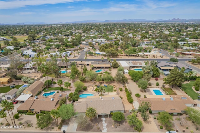 6102 E Aster Dr, Scottsdale, AZ 85254 - aerial perspective of suburban area with a pool area and mountains