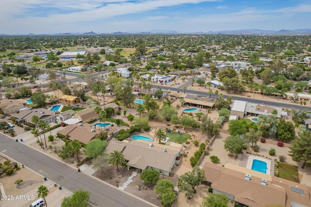 6102 E Aster Dr, Scottsdale, AZ 85254 - aerial perspective of suburban area with a pool and mountains