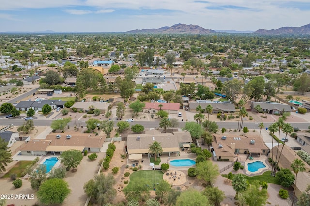 6102 E Aster Dr, Scottsdale, AZ 85254 - aerial perspective of suburban area featuring a pool and a mountainous background