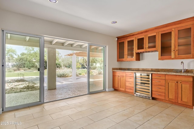6102 E Aster Dr, Scottsdale, AZ 85254 - indoor wet bar with wine cooler, recessed lighting, and light tile patterned floors
