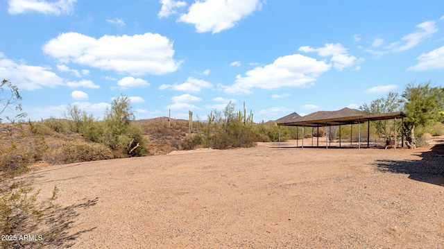 view of yard featuring a carport