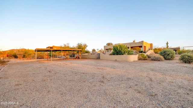 view of yard featuring a gate and fence