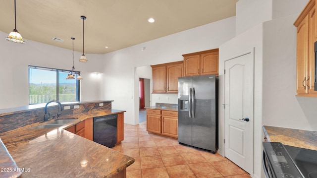 kitchen with light tile patterned floors, visible vents, a sink, hanging light fixtures, and black appliances