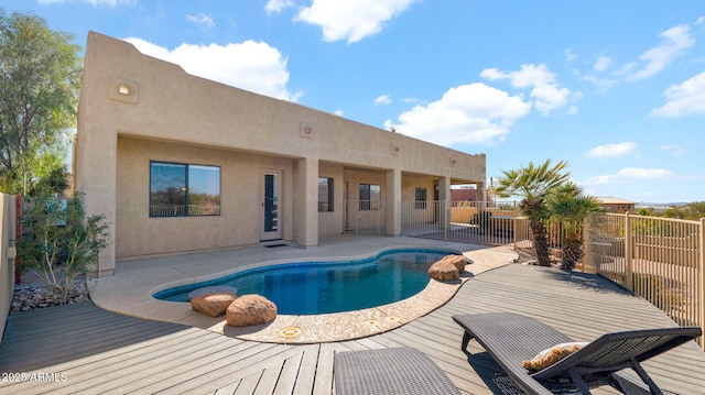 view of pool featuring a fenced in pool, a patio, and fence