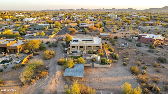 drone / aerial view featuring a mountain view and a residential view