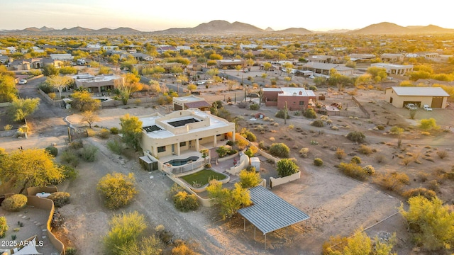 birds eye view of property featuring a mountain view and a residential view