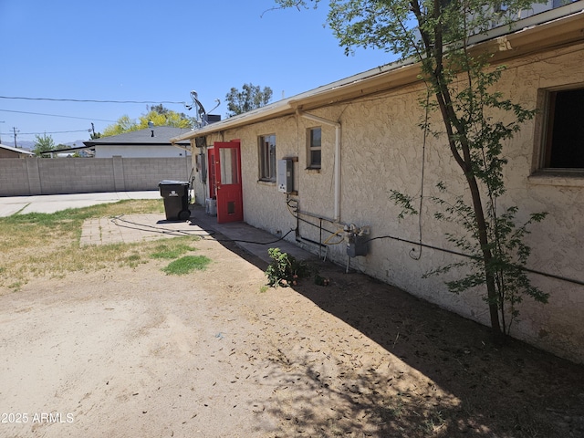 4110 E Wagoner Rd, Phoenix, AZ 85032 - view of side of property featuring stucco siding and a patio