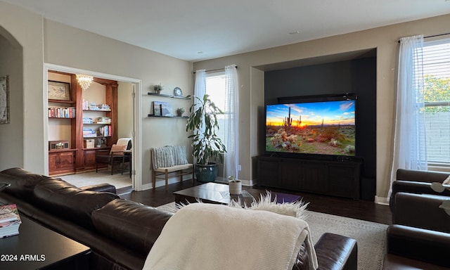 living room with dark wood-type flooring