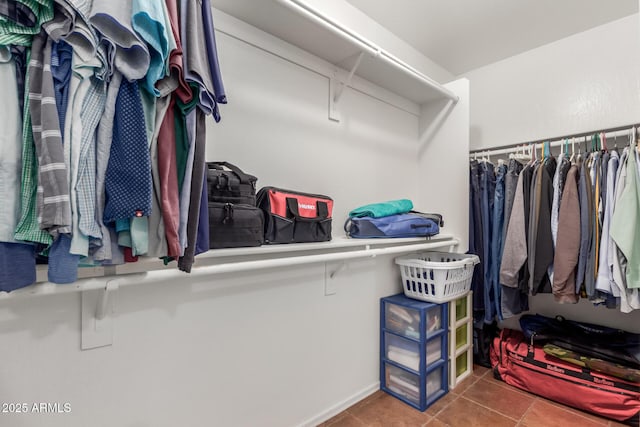 spacious closet with tile patterned flooring