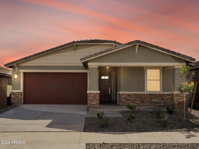 craftsman house featuring a garage