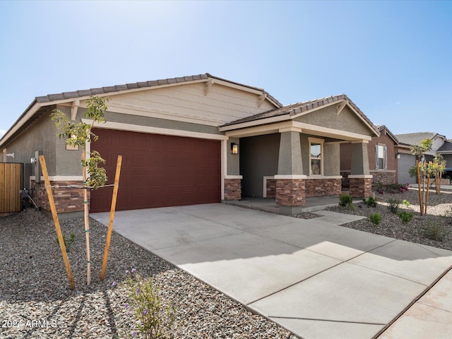 view of front of home with a garage