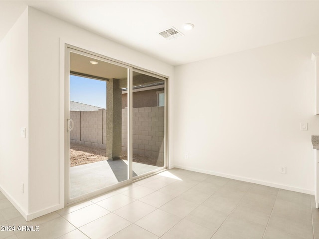 view of tiled spare room