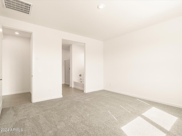 unfurnished bedroom featuring carpet flooring