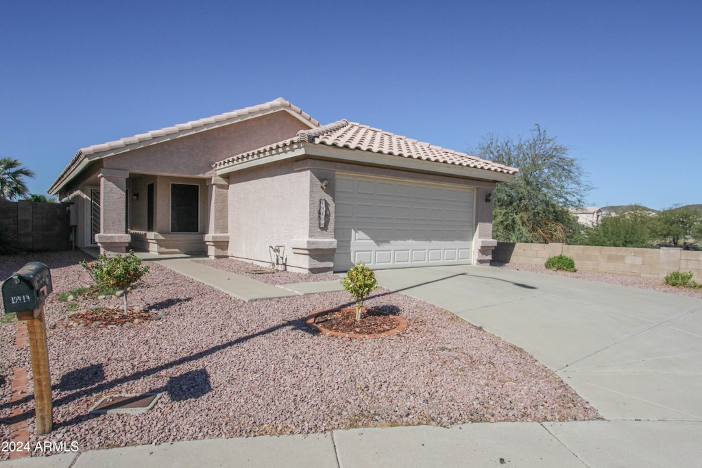 view of front of home featuring a garage