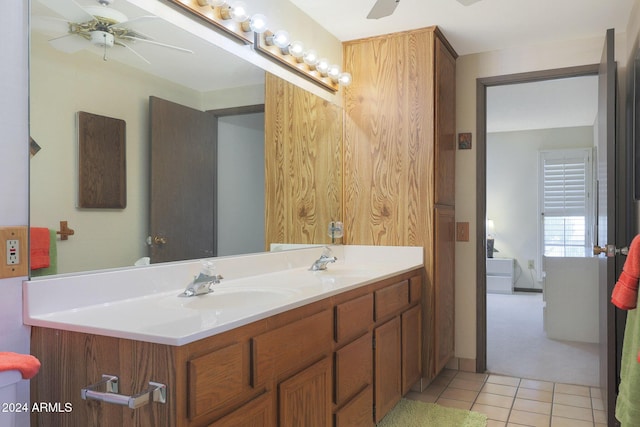 bathroom featuring tile patterned floors and vanity