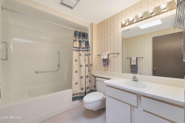 full bathroom featuring vanity, toilet, and shower / tub combo with curtain